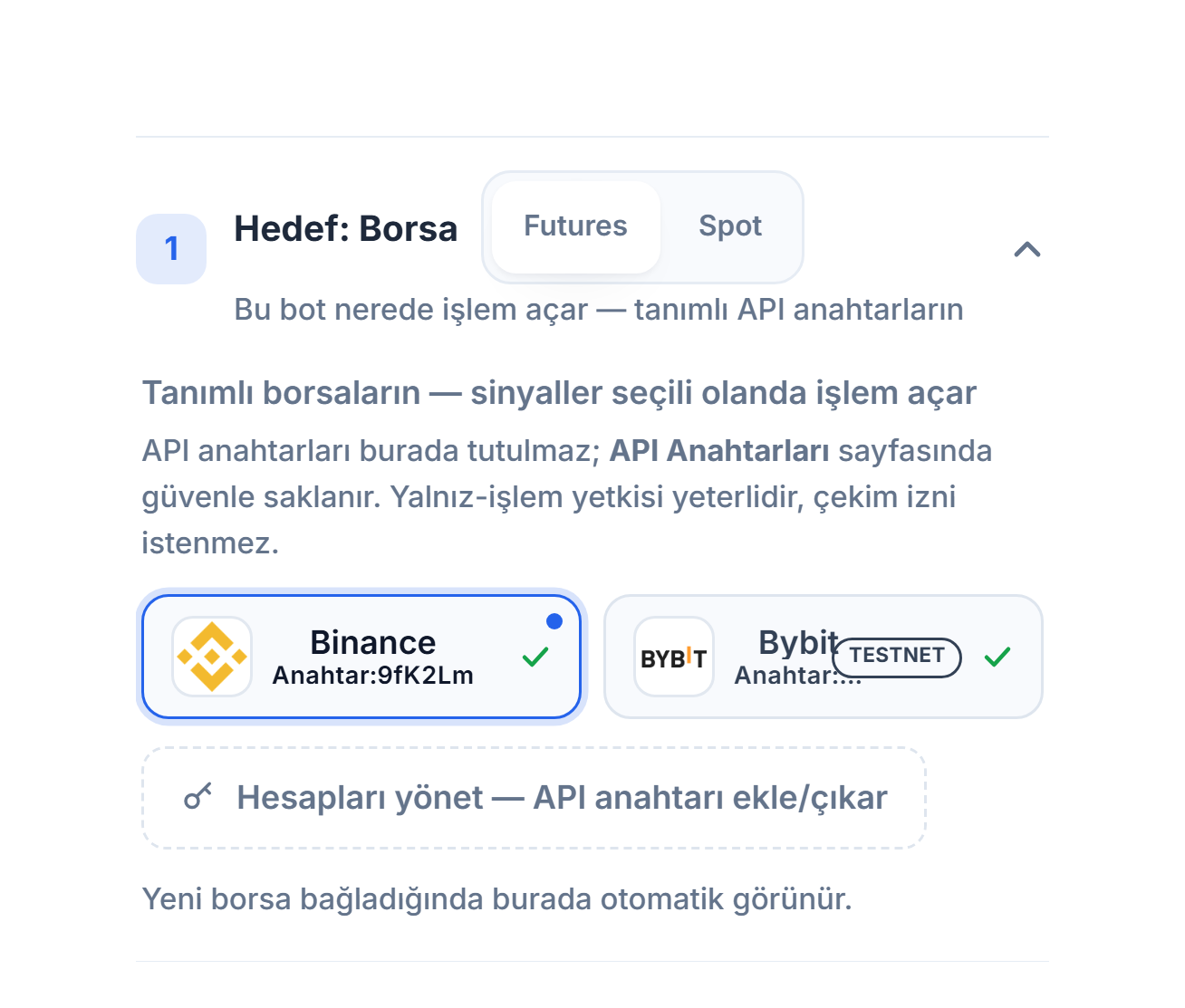 Hedef: Borsa bölümü API anahtarı bağlandıktan sonra: Futures/Spot seçimi, mavi çerçeveli seçili Binance kartı, TESTNET rozetli Bybit kartı ve Hesapları yönet bağlantısı